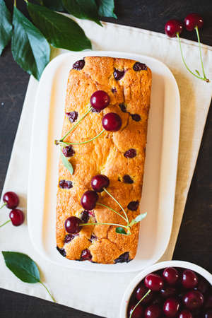 delicious sweet cake with cherries and a fresh cherry on the side. cherry-pie.
