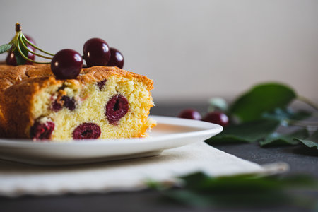 delicious sweet cake with cherries and a fresh cherry on the side. cherry-pie.の写真素材