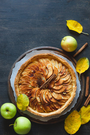Apple pie with cinnamon. Charlotte, a sweet dessert made from apples baked in dough.の写真素材