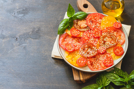 tomato salad with hemp seeds. healthy food concept with superfoodsの写真素材