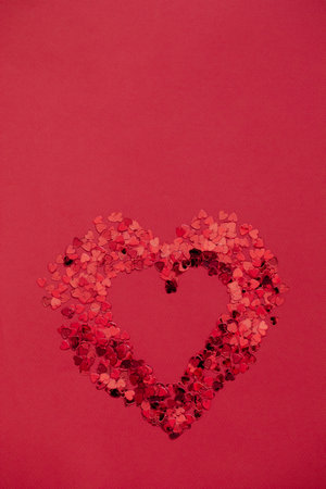 Valentine day background with red hearts on red background, top viewの写真素材