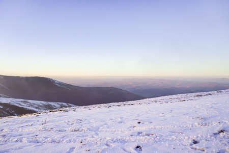 Magic winter sunset in the snowy mountains.の写真素材