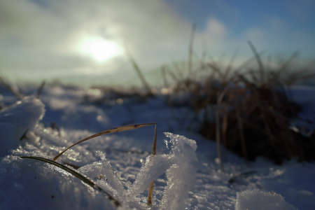 piece of ice in the snowy mountainsの写真素材