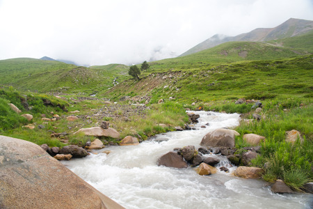 mountain green hills to the rivers and the blue skyの写真素材