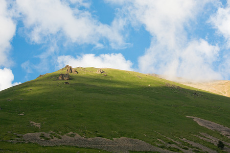 mountain green hills to the rivers and the blue skyの写真素材