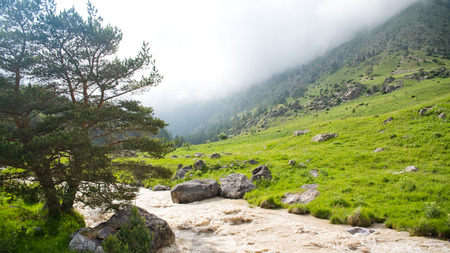mountain green hills to the rivers and the blue skyの写真素材