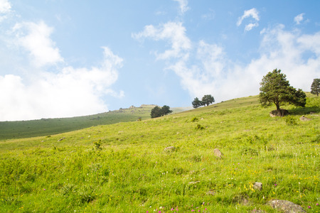 mountain green hills to the rivers and the blue skyの写真素材