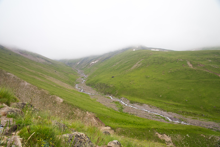 mountain green hills to the rivers and the blue skyの写真素材