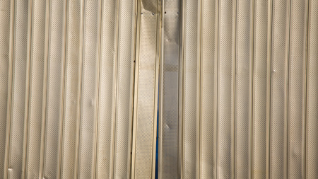 Shiny silver brushed metal surface and rustの写真素材