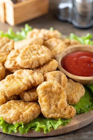 Fried crispy chicken nuggets with ketchup close-upの写真素材