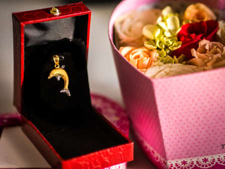 Dolphin Gold Pendant and Rose