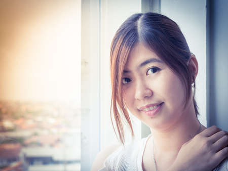 Beautiful Young Asian - Chinese Woman Smilingの写真素材
