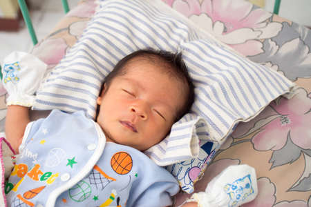 Close Up of Asian Baby Sleepingの写真素材