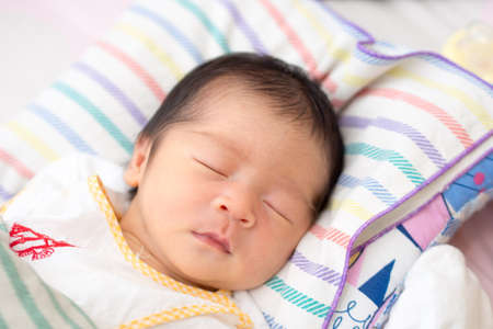 Close Up of Asian Baby Sleepingの写真素材