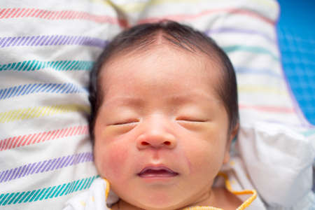 Close Up of Asian Baby Sleepingの写真素材