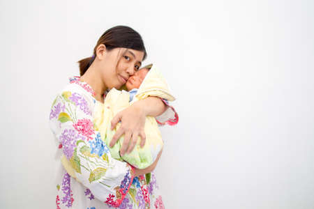 Mother Carrying Her Baby