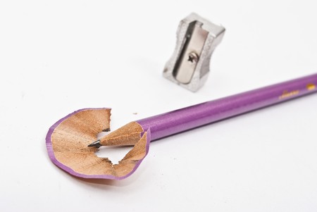 Zatochennyy pencil and heap of the varicoloured shavingの写真素材