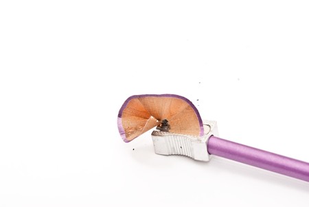 sharp pencil and sharpening on white backgroundの写真素材