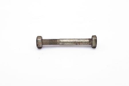 Steel bolt with nut on white backgroundの写真素材