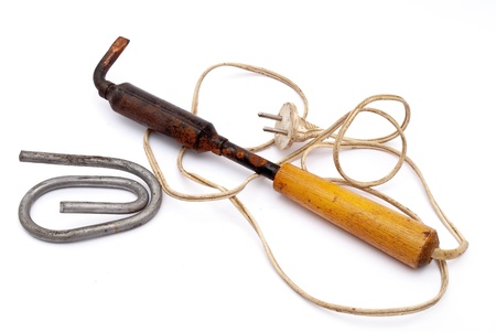 electric instrument for welding with tin on white backgroundの写真素材