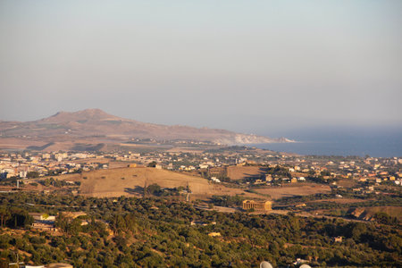 Panoramic view of the Temple of Concordia, an ancient Greek temple of Doric architecture that has survived to this day, located on a hill. Agrigento Sicilyの写真素材