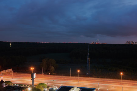 Night view of the highway and the cityの写真素材