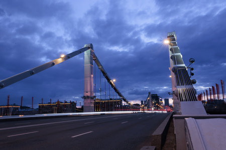 Suspension bridge across the Moskva river at nightの写真素材
