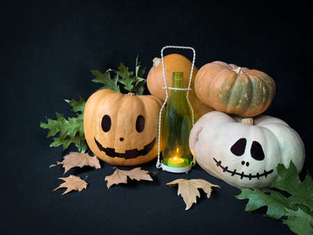 Happy Halloween pumpkins with dark wall backgroundの写真素材