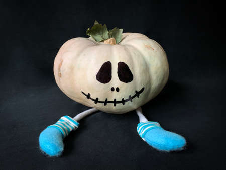 Halloween pumpkin cute character with legs wearing blue socksの写真素材