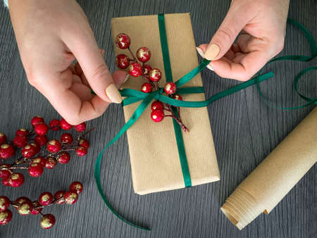 Decorating handmade craft holiday gift box. Top view.の写真素材