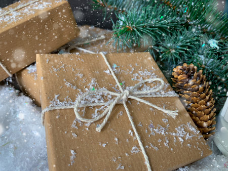 Christmas handmade gift boxes decorated with craft paper and twine. Merry christmas greeting card. Winter  Holidays theme. Happy New Year.の写真素材