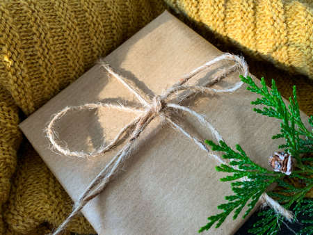 Close up view handmade gift box. Christmas holiday cozy, mood concept.の写真素材
