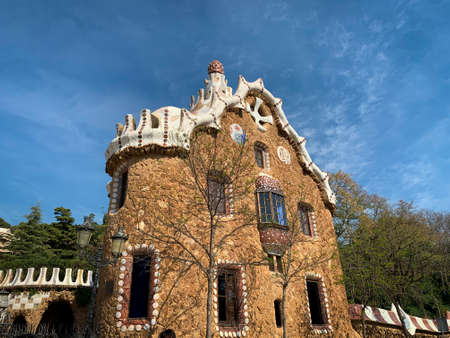 Building at the main entrance at Park Guell, Barcelona, Spain. Architect Antonio Gaudi.のeditorial素材