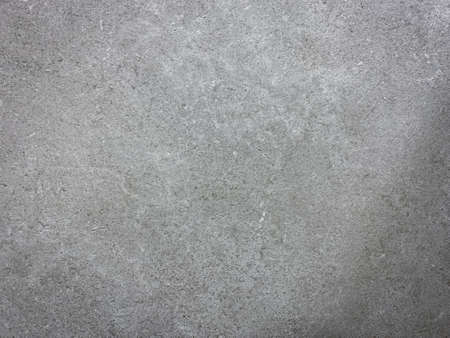 Gray concrete texture with scratches natural stone background.の写真素材