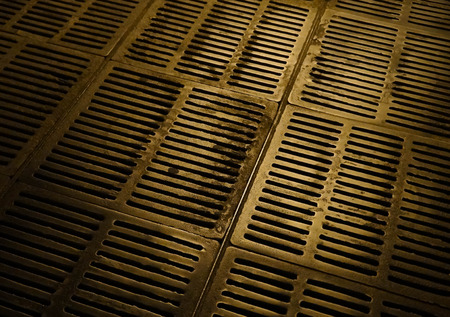 Canalization and urban sewerage grey metallic hatch undergroundの写真素材