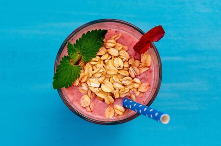 Strawberry and banana smoothie. Healthy breakfast or snack. Banana and strawberry smoothie in glass...