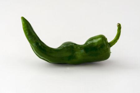 green chili pepper on the white backgroundの写真素材