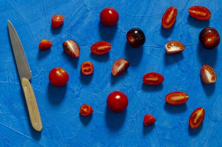 tomatoes on colored background. Compositionの写真素材