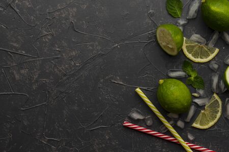 Ingredients for making mojito on grey concrete or stone background.