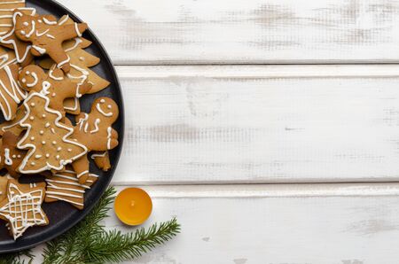 gingerbread christmas cookies on white wooden