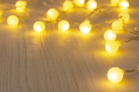 christmas light background. big lights. Christmas gerland on white boards.