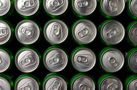 metal beer cans background green andの写真素材
