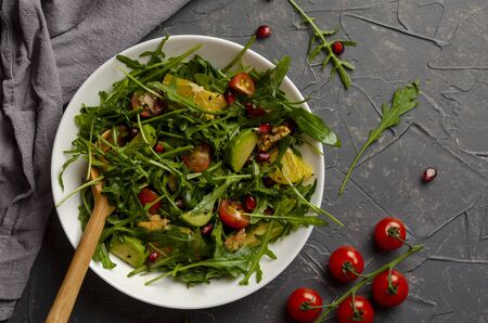 Avocado with Orange arugula salad with olive oil andの写真素材