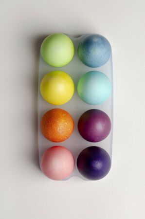 multi colored easter eggs isolated on whiteの写真素材