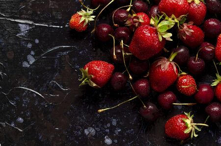 fresh berries on dark background. Vertical.の写真素材