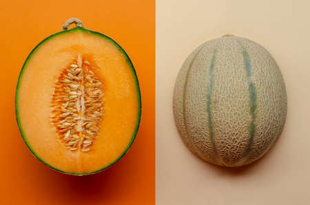 Creative layout made of melon. Flat lay. Food concept. Melon on the colored background.の写真素材
