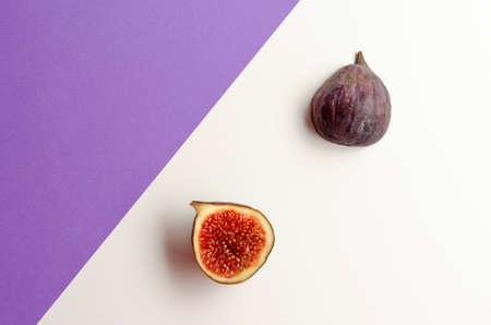 still life organic fig fruits, violet background. copy spaceの写真素材