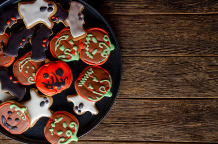 gingerbread for Halloween and pumpkin on wooden background. Space forの写真素材
