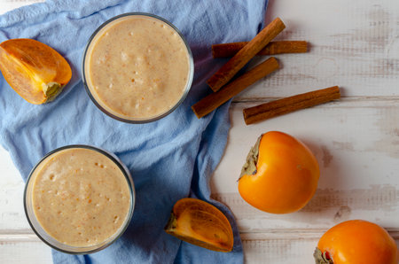Persimmon smoothie with orange, milk andの写真素材