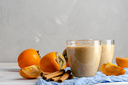 Persimmon smoothie with orange, milk andの写真素材